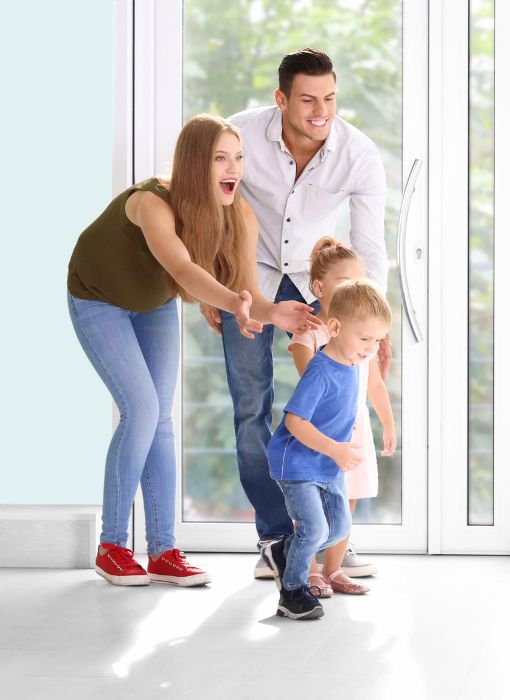 Family walking into new house Family walking into new house